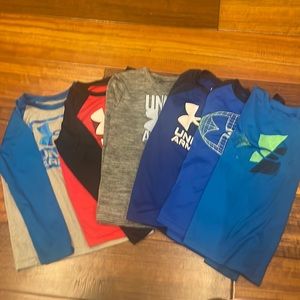 Good condition Under Armour Dri fit long sleeve tees. Size 7.